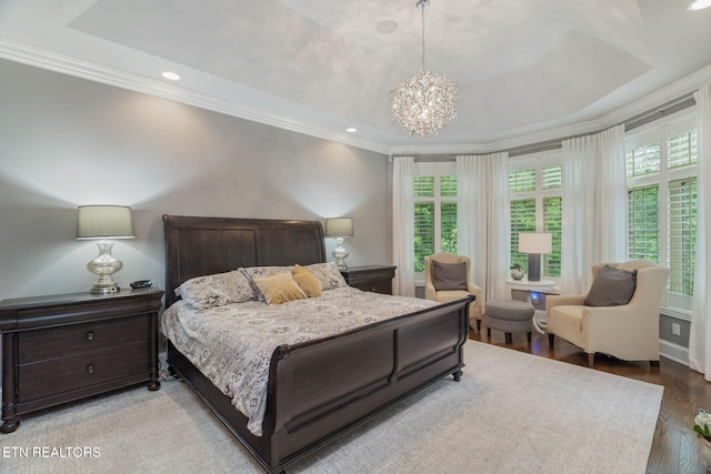 111 Winchester Cir, Oak Ridge, TN 37830 - bedroom with a tray ceiling, ornamental molding, wood finished floors, a chandelier, and recessed lighting