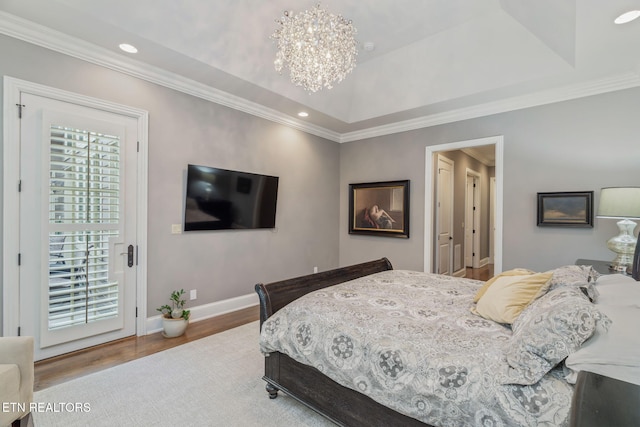 111 Winchester Cir, Oak Ridge, TN 37830 - bedroom featuring baseboards, a chandelier, wood finished floors, recessed lighting, and a tray ceiling