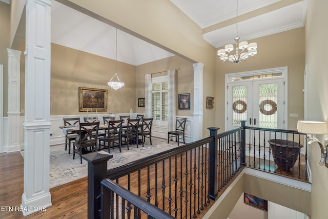 111 Winchester Cir, Oak Ridge, TN 37830 - entryway featuring a chandelier, wood finished floors, a towering ceiling, ornamental molding, and a wainscoted wall