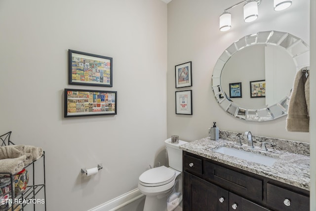 111 Winchester Cir, Oak Ridge, TN 37830 - bathroom with toilet, vanity, and baseboards