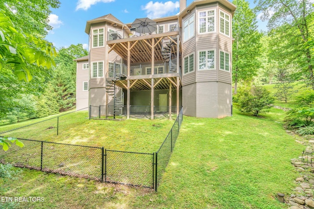111 Winchester Cir, Oak Ridge, TN 37830 - rear view of house with a deck, stairway, a gate, and a chimney
