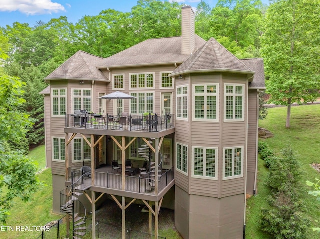 111 Winchester Cir, Oak Ridge, TN 37830 - rear view of house featuring a wooden deck, stairway, a chimney, and a shingled roof
