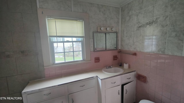 806 Vale St, Loudon, TN 37774 - bathroom featuring tile walls, vanity, and ornamental molding