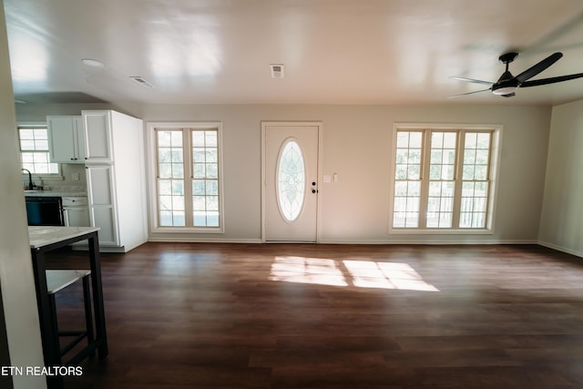 1799 Baker Hwy, Huntsville, TN 37756 - foyer entrance featuring ceiling fan, baseboards, and dark wood-style flooring