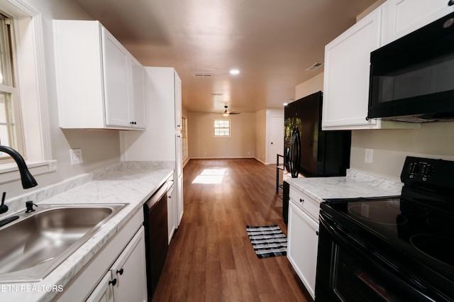 1799 Baker Hwy, Huntsville, TN 37756 - kitchen with black appliances, a sink, white cabinetry, dark wood finished floors, and recessed lighting