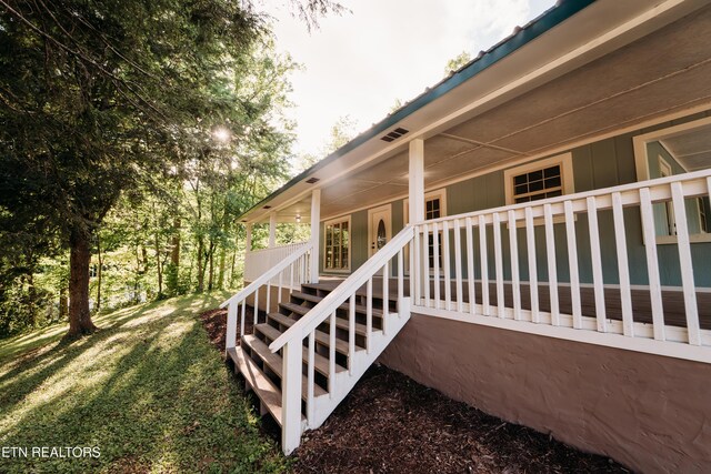 1799 Baker Hwy, Huntsville, TN 37756 - property entrance with a porch