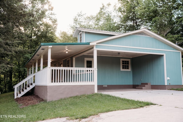 1799 Baker Hwy, Huntsville, TN 37756 - view of front facade with driveway, crawl space, and stairs