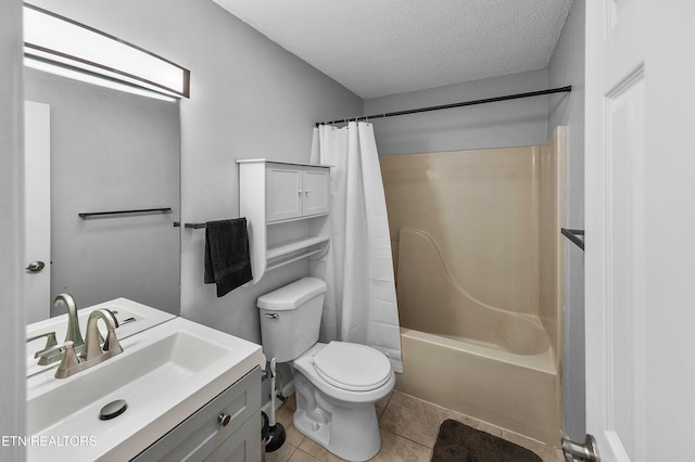 1316 Mountain Meadows Way, Sevierville, TN 37862 - bathroom featuring toilet, a textured ceiling, tile patterned flooring, vanity, and shower / bath combo