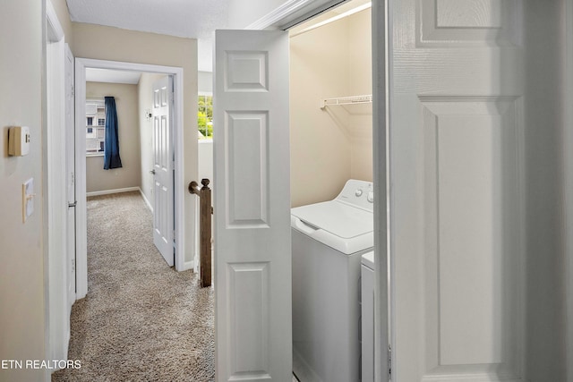 1316 Mountain Meadows Way, Sevierville, TN 37862 - laundry room with washing machine and clothes dryer, baseboards, and carpet flooring