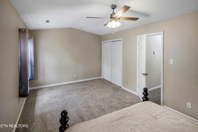 1316 Mountain Meadows Way, Sevierville, TN 37862 - unfurnished bedroom with carpet floors, baseboards, a closet, ceiling fan, and vaulted ceiling