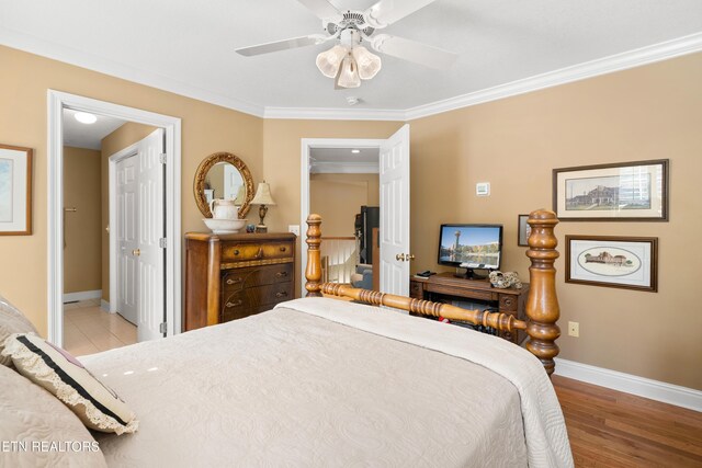 12311 Willow Ridge Ln, Farragut, TN 37934 - bedroom featuring baseboards, crown molding, light wood-style floors, and a ceiling fan