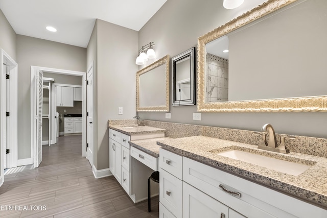 338 Cape Lookout Lgt, Loudon, TN 37774 - full bath featuring double vanity, baseboards, recessed lighting, and wood finished floors