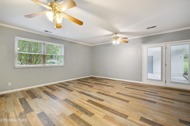 7613 Luscombe Dr, Knoxville, TN 37919 - spare room with ceiling fan, wood finished floors, baseboards, and crown molding