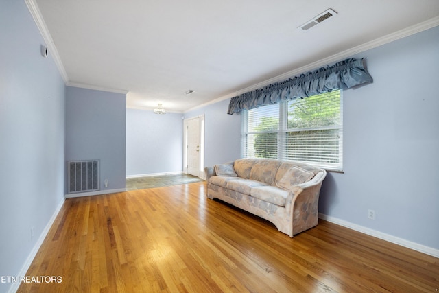 7613 Luscombe Dr, Knoxville, TN 37919 - living area featuring ornamental molding, wood finished floors, and baseboards