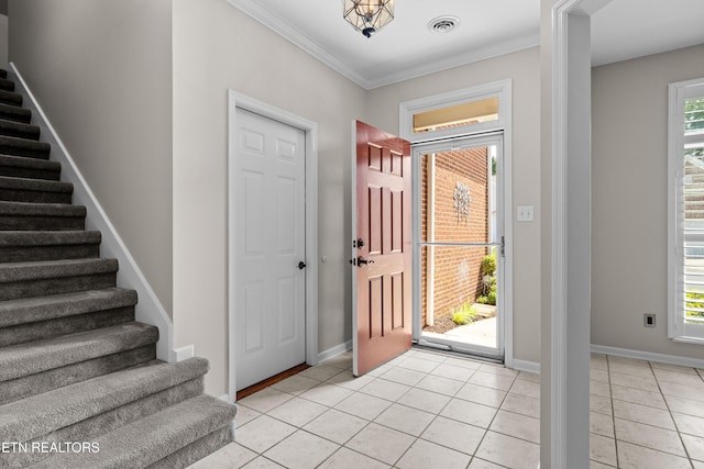 1025 Ree Way Unit 20, Knoxville, TN 37909 - entryway with stairway, light tile patterned floors, crown molding, and baseboards