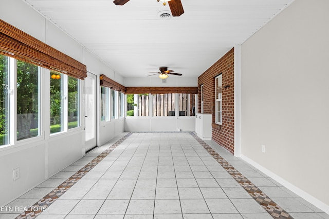 1025 Ree Way Unit 20, Knoxville, TN 37909 - unfurnished sunroom featuring a ceiling fan