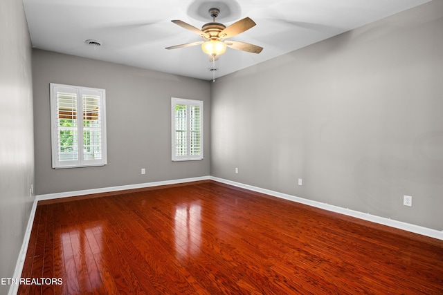1025 Ree Way Unit 20, Knoxville, TN 37909 - spare room featuring dark wood-type flooring, plenty of natural light, and baseboards