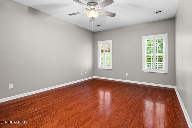 1025 Ree Way Unit 20, Knoxville, TN 37909 - spare room with dark wood-type flooring, baseboards, and ceiling fan