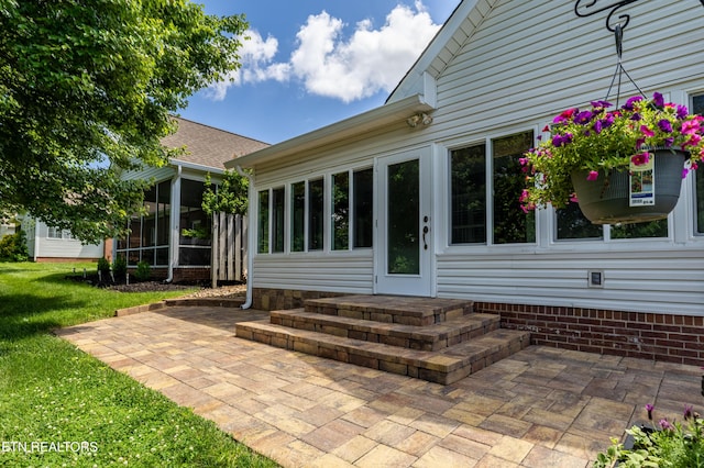 1025 Ree Way Unit 20, Knoxville, TN 37909 - view of patio featuring a sunroom and entry steps