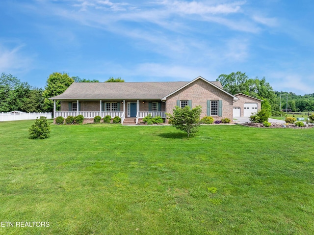 6799 Hickory Creek Rd, Lenoir City, TN 37771 - ranch-style home featuring covered porch and brick siding