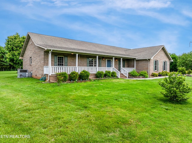 6799 Hickory Creek Rd, Lenoir City, TN 37771 - ranch-style home with a porch, brick siding, and a front yard