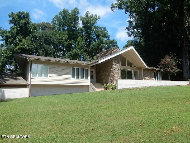 3729 Vista Rd, Louisville, TN 37777 - view of front of home featuring stone siding and a front lawn