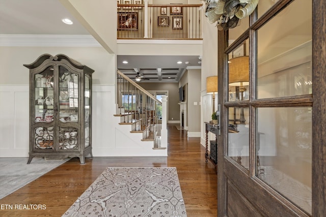 436 Silent River Ln, Loudon, TN 37774 - entryway with ornamental molding, a decorative wall, stairway, a ceiling fan, and wood finished floors
