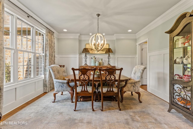 436 Silent River Ln, Loudon, TN 37774 - dining room featuring healthy amount of natural light, a chandelier, a decorative wall, ornamental molding, and wood finished floors