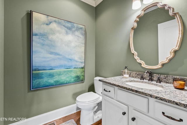 436 Silent River Ln, Loudon, TN 37774 - bathroom featuring vanity, wood finished floors, toilet, crown molding, and baseboards