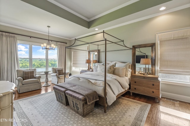 436 Silent River Ln, Loudon, TN 37774 - bedroom with a chandelier, crown molding, wood finished floors, baseboards, and recessed lighting