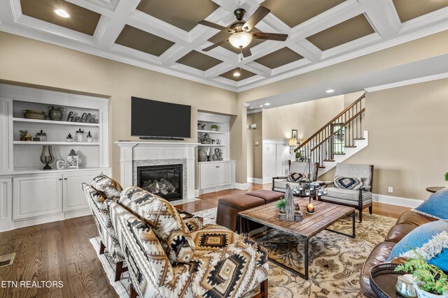 436 Silent River Ln, Loudon, TN 37774 - living room with coffered ceiling, ornamental molding, ceiling fan, wood finished floors, and a premium fireplace