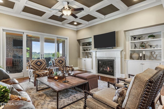 436 Silent River Ln, Loudon, TN 37774 - living area with a fireplace, light wood finished floors, coffered ceiling, a ceiling fan, and ornamental molding