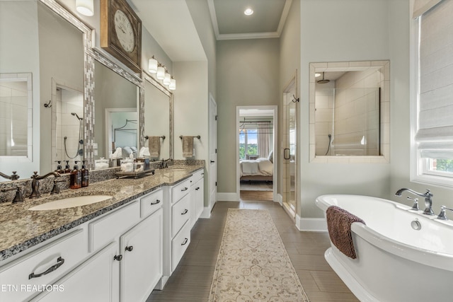 436 Silent River Ln, Loudon, TN 37774 - full bath with a stall shower, double vanity, healthy amount of natural light, a freestanding tub, and ornamental molding