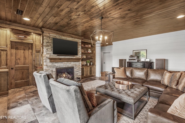 436 Silent River Ln, Loudon, TN 37774 - living room featuring wooden ceiling, a chandelier, a fireplace, and wooden walls