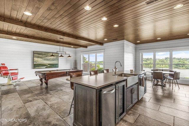 436 Silent River Ln, Loudon, TN 37774 - kitchen featuring a sink, wine cooler, wooden ceiling with exposed beams, recessed lighting, and a kitchen island with sink