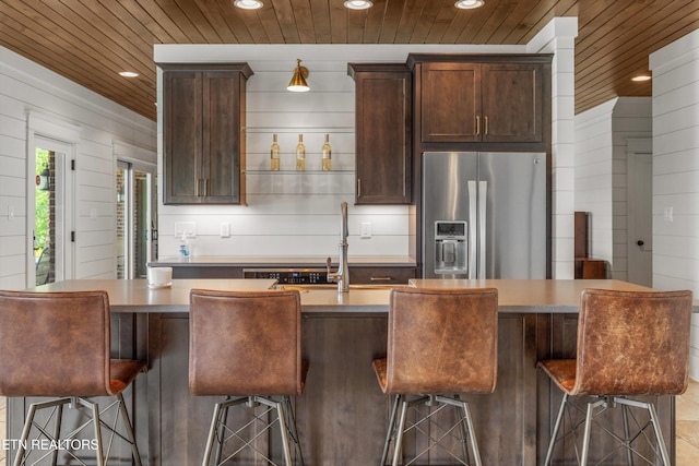 436 Silent River Ln, Loudon, TN 37774 - kitchen featuring stainless steel fridge with ice dispenser, recessed lighting, wood ceiling, a kitchen island with sink, and dark brown cabinets