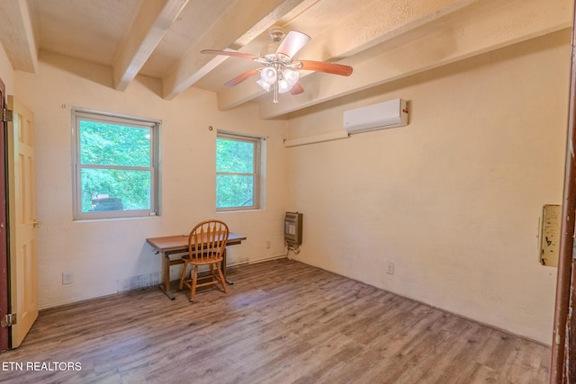 944 Smoky Mountain View Ct, Seymour, TN 37865 - spare room with a wall unit AC, beamed ceiling, heating unit, light wood-style floors, and ceiling fan