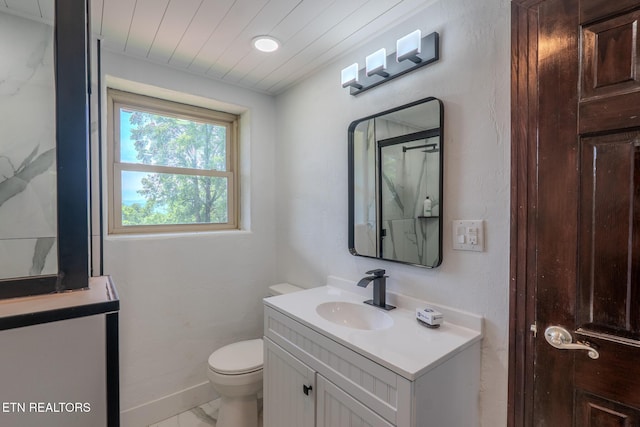 944 Smoky Mountain View Ct, Seymour, TN 37865 - bathroom with vanity, toilet, marble look tile flooring, a shower, and baseboards
