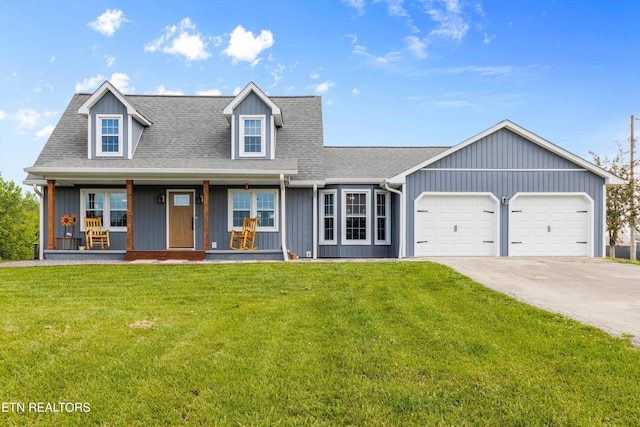 448 Trinity Rd, Morristown, TN 37814 - cape cod home featuring an attached garage, a front yard, a porch, and driveway