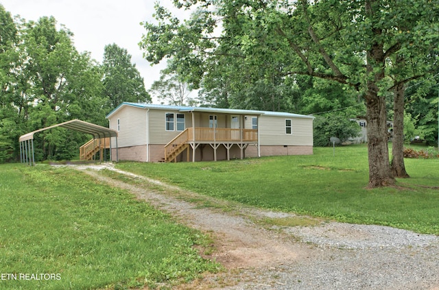 168 Misty Mountain Dr, Maryville, TN 37803 - view of front of property with driveway, stairs, a front lawn, a carport, and crawl space