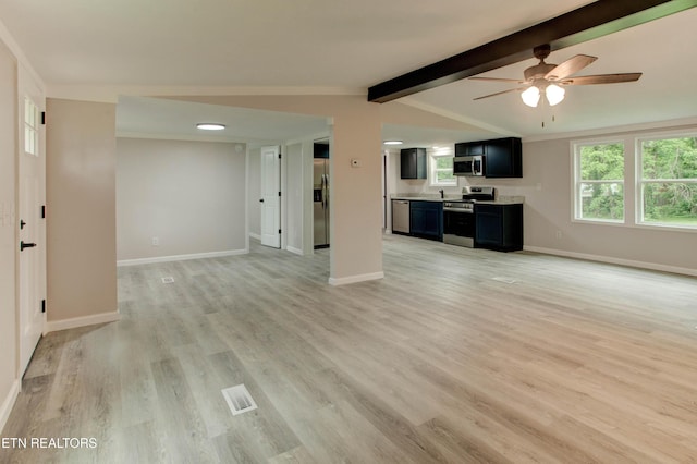 168 Misty Mountain Dr, Maryville, TN 37803 - unfurnished living room featuring light wood-type flooring, ceiling fan, and baseboards