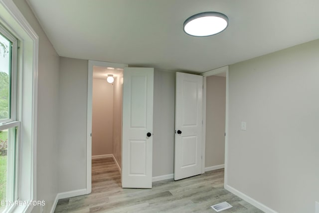 168 Misty Mountain Dr, Maryville, TN 37803 - below grade area featuring light wood-style flooring and baseboards