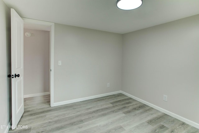 168 Misty Mountain Dr, Maryville, TN 37803 - spare room with light wood-style flooring, baseboards, and a smoke detector