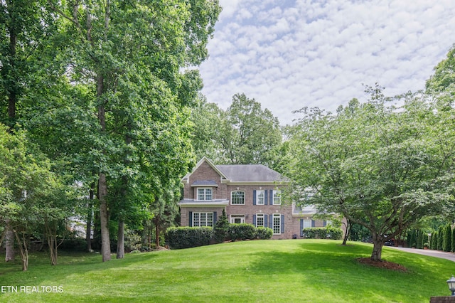 129 Whippoorwill Dr, Oak Ridge, TN 37830 - view of front of home featuring brick siding and a front yard