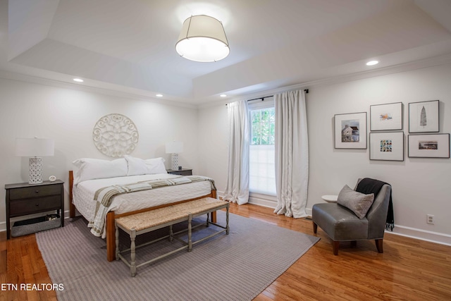 129 Whippoorwill Dr, Oak Ridge, TN 37830 - bedroom with a tray ceiling, wood finished floors, baseboards, ornamental molding, and recessed lighting