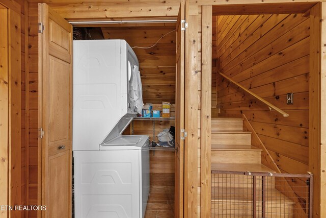 1949 E Mountain View Way, Sevierville, TN 37876 - laundry area featuring stacked washer and clothes dryer and wood walls