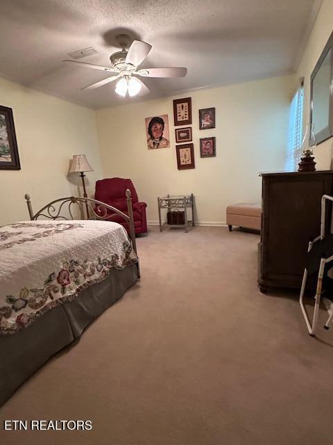 5230 Brig Ln, Knoxville, TN 37914 - bedroom featuring light carpet, baseboards, and ceiling fan