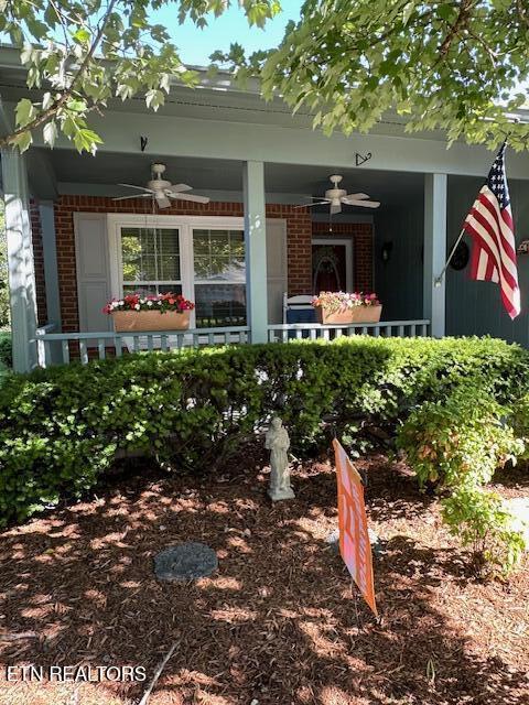5230 Brig Ln, Knoxville, TN 37914 - property entrance featuring ceiling fan and brick siding