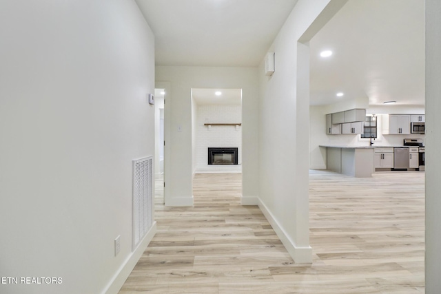 1122 N Shady Lane Loop, Clarkrange, TN 38553 - hall featuring light wood finished floors, recessed lighting, and baseboards