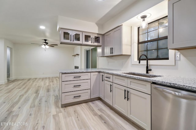 1122 N Shady Lane Loop, Clarkrange, TN 38553 - kitchen featuring stainless steel dishwasher, a sink, a peninsula, ceiling fan, and light wood-style flooring